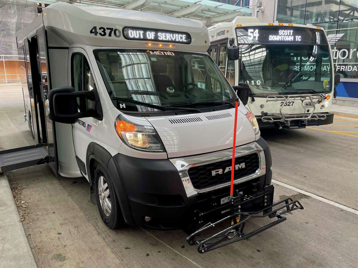One of Metropolitan Transit Authority's new smaller vans awaits a passenger at the Downtown Transit Center on Wednesday, Dec. 8, 2021, in Houston. The new vans have drawn praise for being more convenient for disabled passengers.