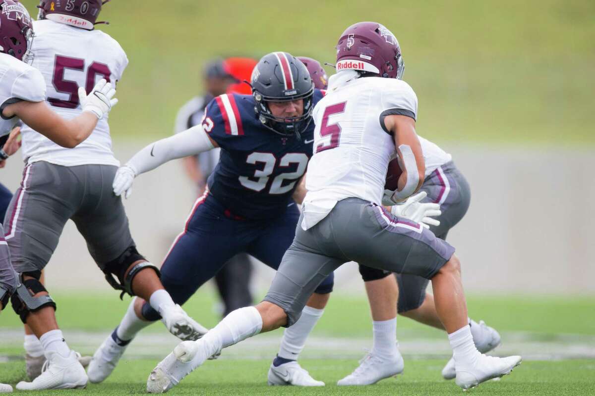 Tompkins Falcon LB Bryce Shaink (32) tackles Magnolia Bulldogs RB Michael Carter (5) during first half of action between Tompkins Falcons vs. Magnolia Bulldogs during a high school football game at the Legacy Stadium, Saturday, August 28, 2021, in Katy. (Juan DeLeon/Contributor)