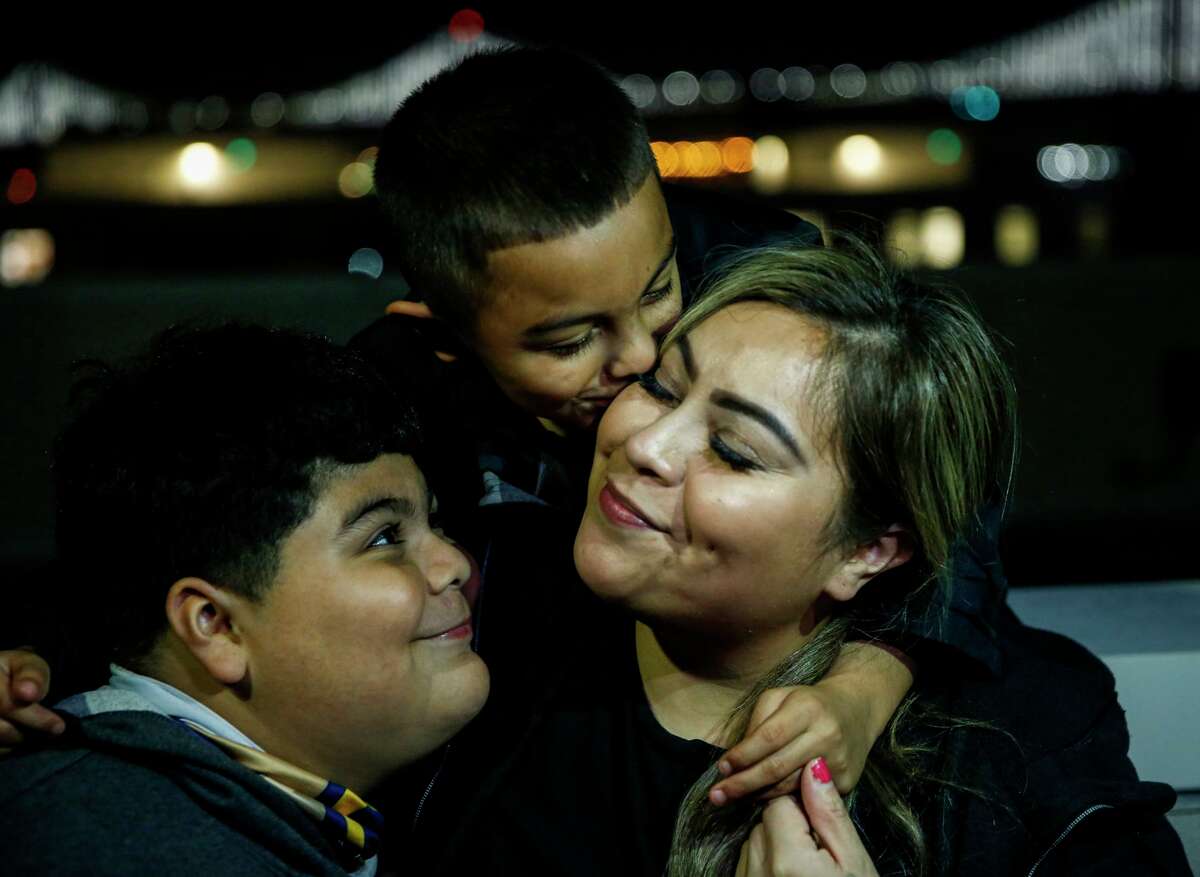 Cristina Niu and sons Victor, 10, and Angelo, 6, moved out of an overcrowded house into their own place.