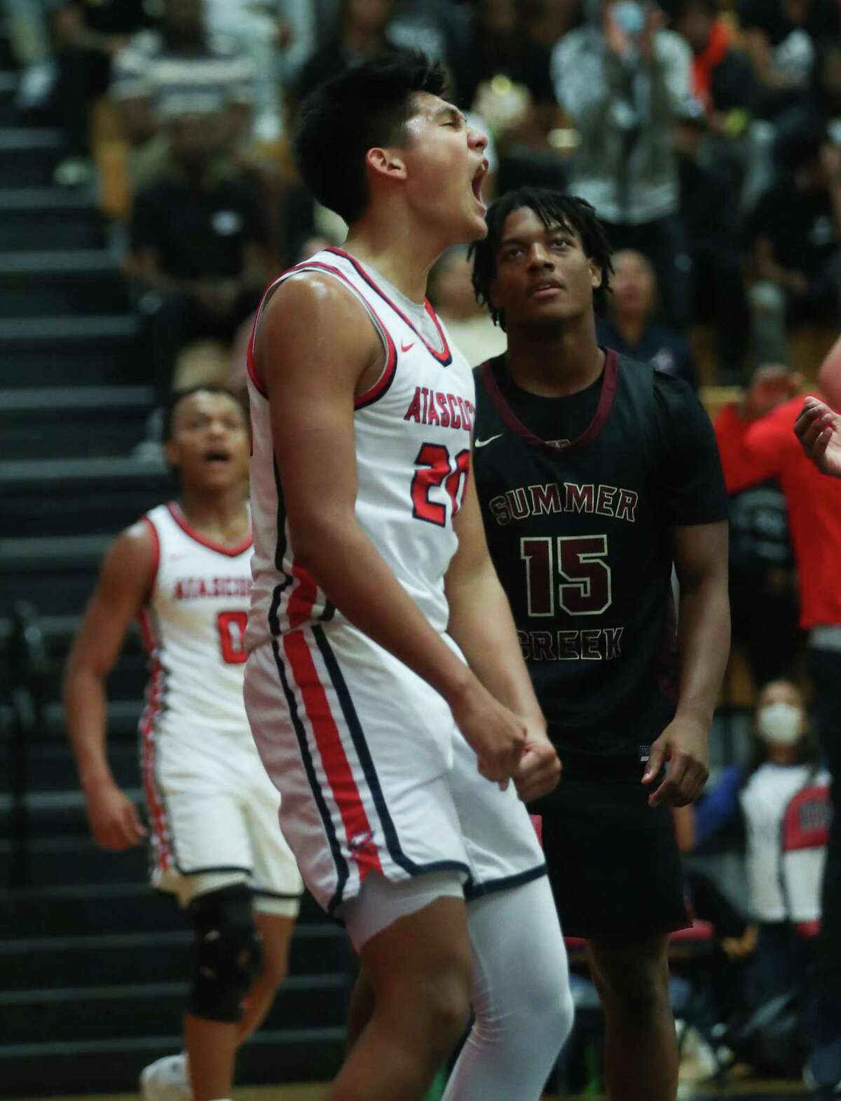 Atascocita’s Landyn Jumawan (20) reacts after scoring and drawing a foul against Summer Creek during a District 21-6A high school basketball game Friday, Dec. 17, 2021 in Humble.