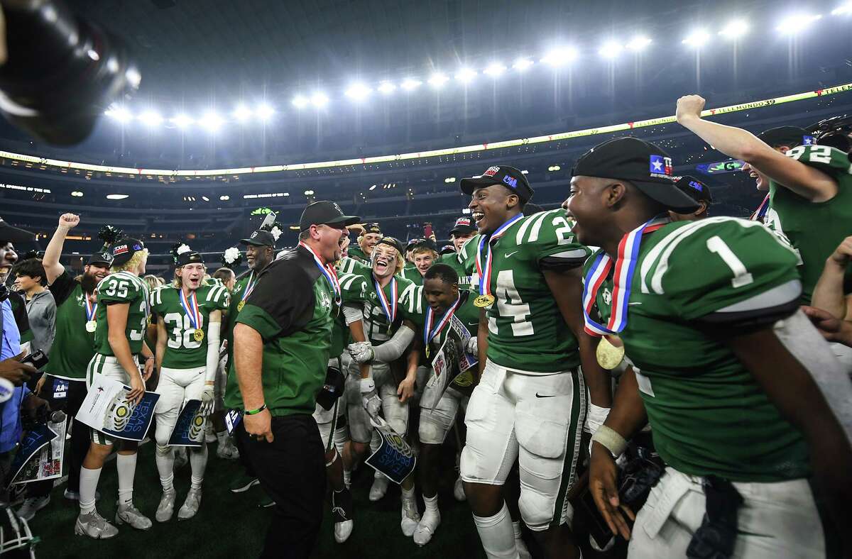 Franklin head coach Mark Fannin celebrates with his team after winning the Class 3A Division II state championship 49-35 against Gunter at AT&T Stadium in Arlington on Thursday, Dec. 16, 2021.
