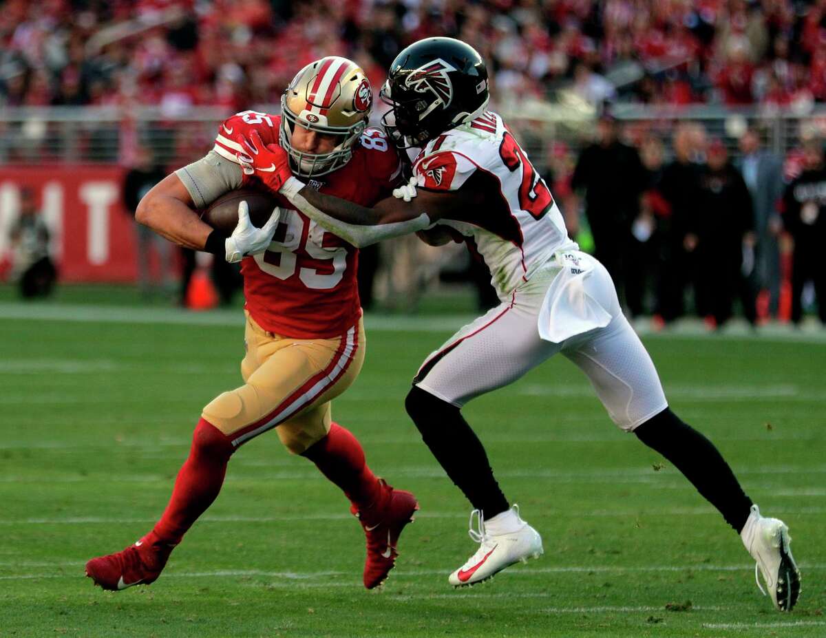 George Kittle runs after a catch while defended by the Falcons’ Demontae Kazee in 2019. Atlanta upset the 49ers, who were coming off a road trip, with a 29-22 victory at Levi’s Stadium.