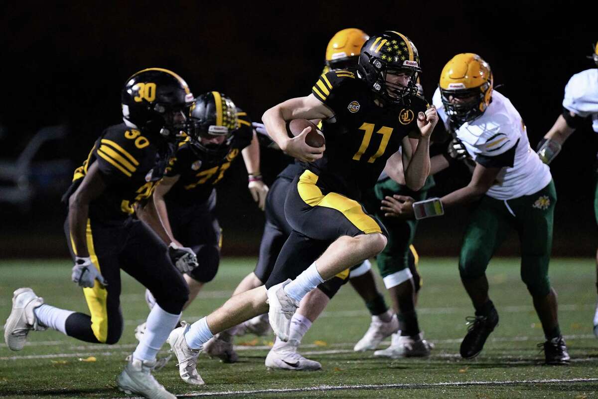 Football action between Jonathan Law and Hamden High, Friday, November 12, 2021 in Milford, CT