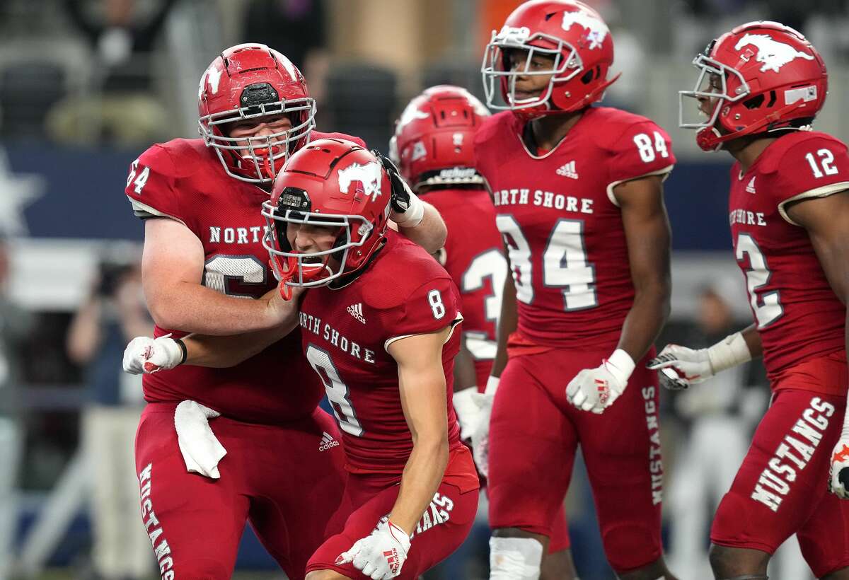 North Shore wide receiver David Amador (8) celebrates his touchdown against Duncanville during the 6A Division 1 State Championship game at At&T Stadium in Arlington on Saturday, Dec. 18, 2021. North Shore won the game 17-10.