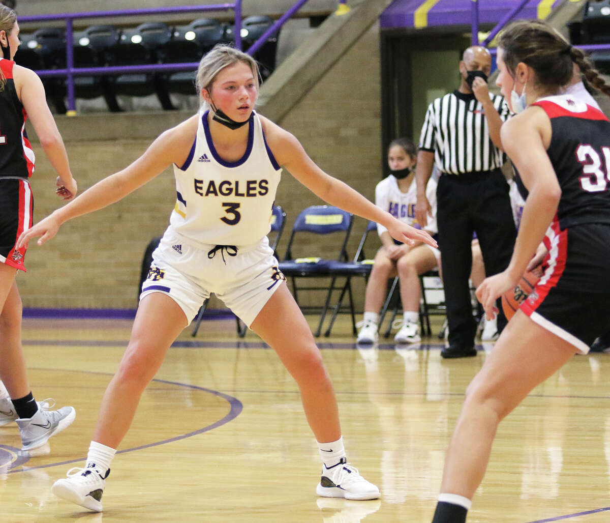 CM's Kelbie Zupan (3) defends a Mount Zion ballhander in a game last month at the Taylorville Tourney. On Saturday night, Zupan scored a career-high 22 points in the Eagles victory over Parkway South at the Visitation Christmas Tournament in St. Louis.  
