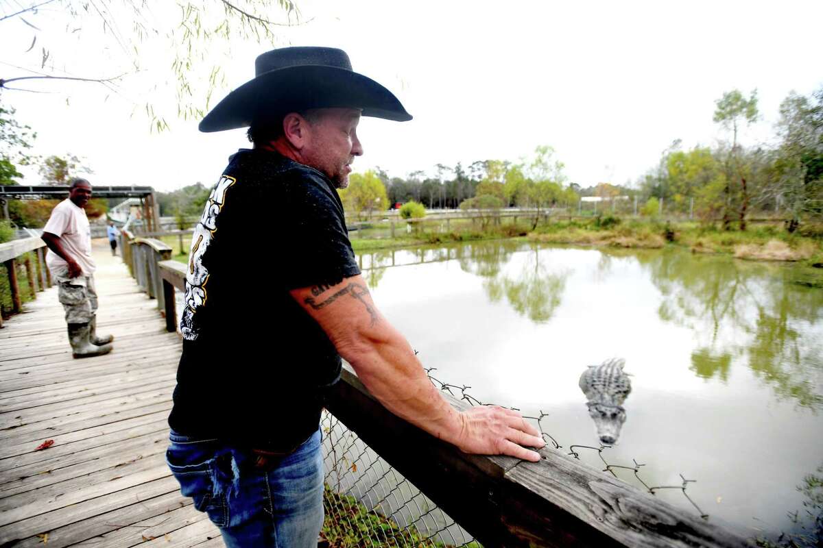 Gary Saurage shows some of the updates and expansion plans at Gator Country, which by early next year will include a full restaurant, and later entertainment areas for adults and children. Photo made Thursday, December 9, 2021 Kim Brent/The Enterprise