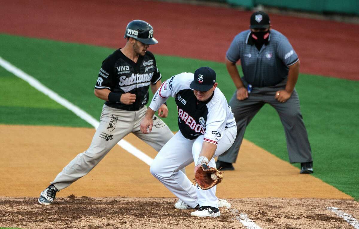 Tecolotes Dos Laredos first baseman Balbino Fuenmayor grabs a pick-off attempt during a game against Sultanes de Monterrey, Wednesday, June 2, 2021, at Uni-Trade Stadium.