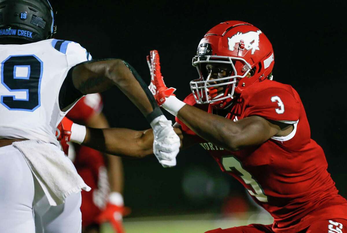 North Shore defensive back Denver Harris (3) covers Shadow Creek wide receiver C.J. Guidry (19) during the second half of the game at Galena Park ISD Stadium on Friday, Sept. 25, 2020, in Houston.