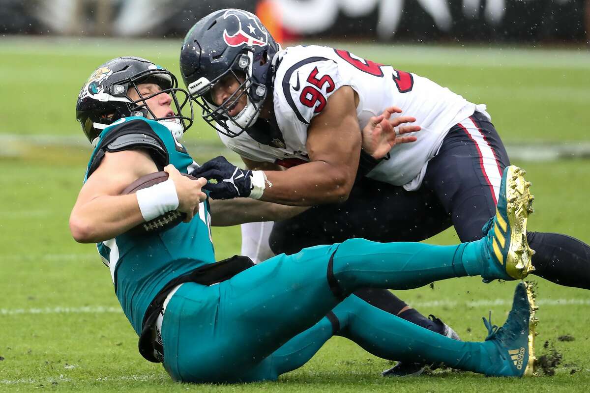 Houston Texans defensive lineman Derek Rivers (95) looks to make