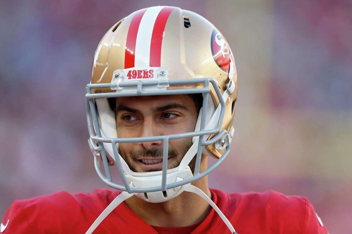 SANTA CLARA, CALIFORNIA - DECEMBER 19: Jimmy Garoppolo #10 of the San Francisco 49ers looks on during play in the first half of the game against the Atlanta Falcons at Levi's Stadium on December 19, 2021 in Santa Clara, California. (Photo by Lachlan Cunningham/Getty Images)