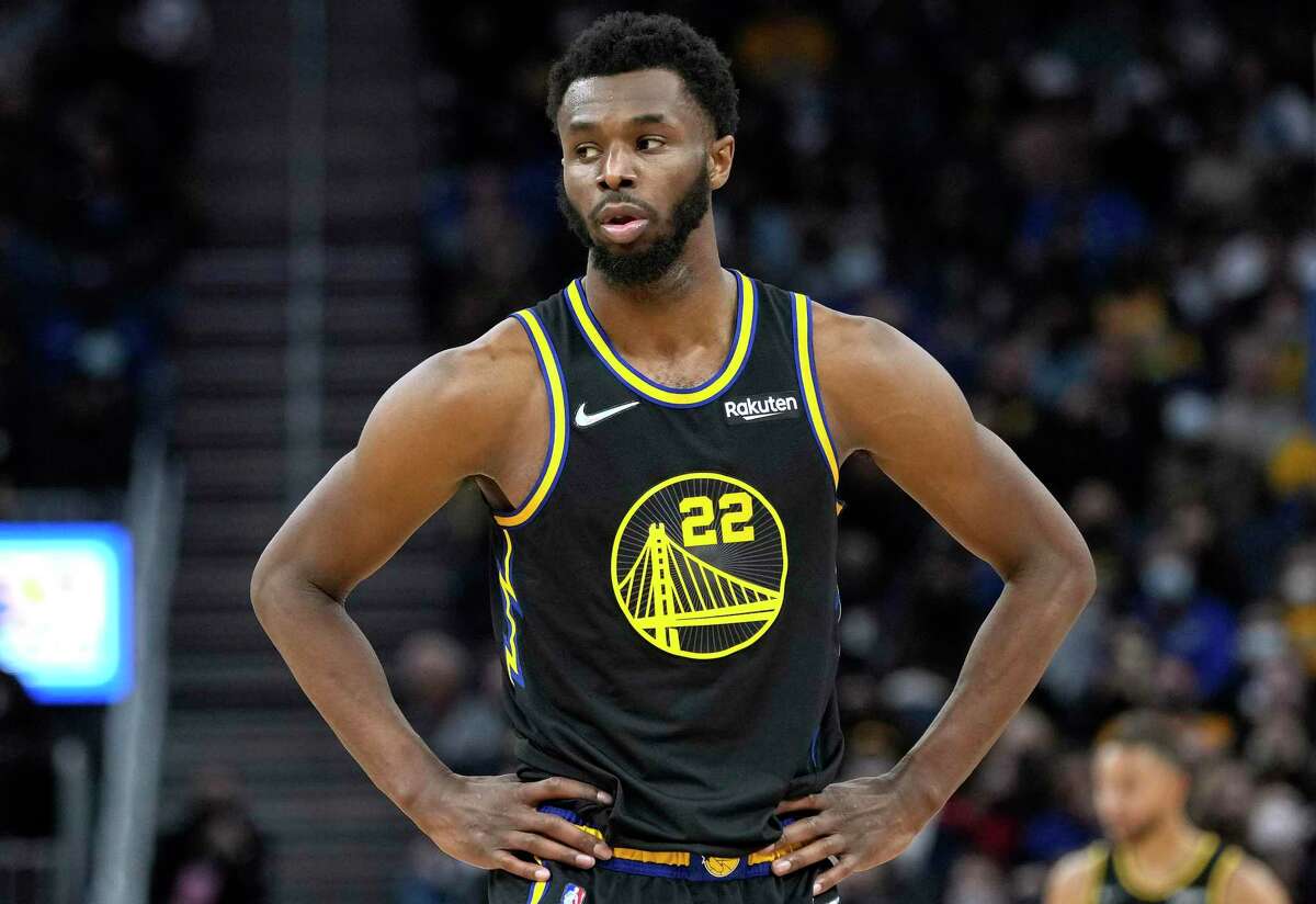 SAN FRANCISCO, CALIFORNIA - NOVEMBER 24: Andrew Wiggins #22 of the Golden State Warriors looks on against the Philadelphia 76ers during the fourth quarter of an NBA basketball game at Chase Center on November 24, 2021 in San Francisco, California. NOTE TO USER: User expressly acknowledges and agrees that, by downloading and or using this photograph, User is consenting to the terms and conditions of the Getty Images License Agreement. (Photo by Thearon W. Henderson/Getty Images)