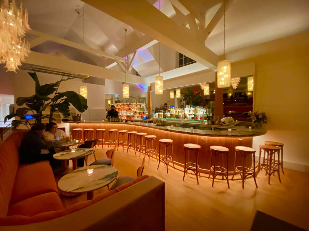 The bright, stylish interior of Good Night in  Woodstock evokes the glamor of old Hollywood.
