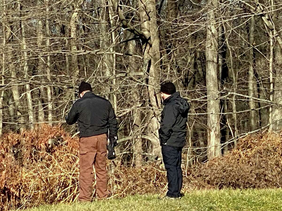 State police search an area of New Canaan town property adjacent to Waveny Park in connection with the Jennifer Dulos case on Monday, Dec. 20, 2021.