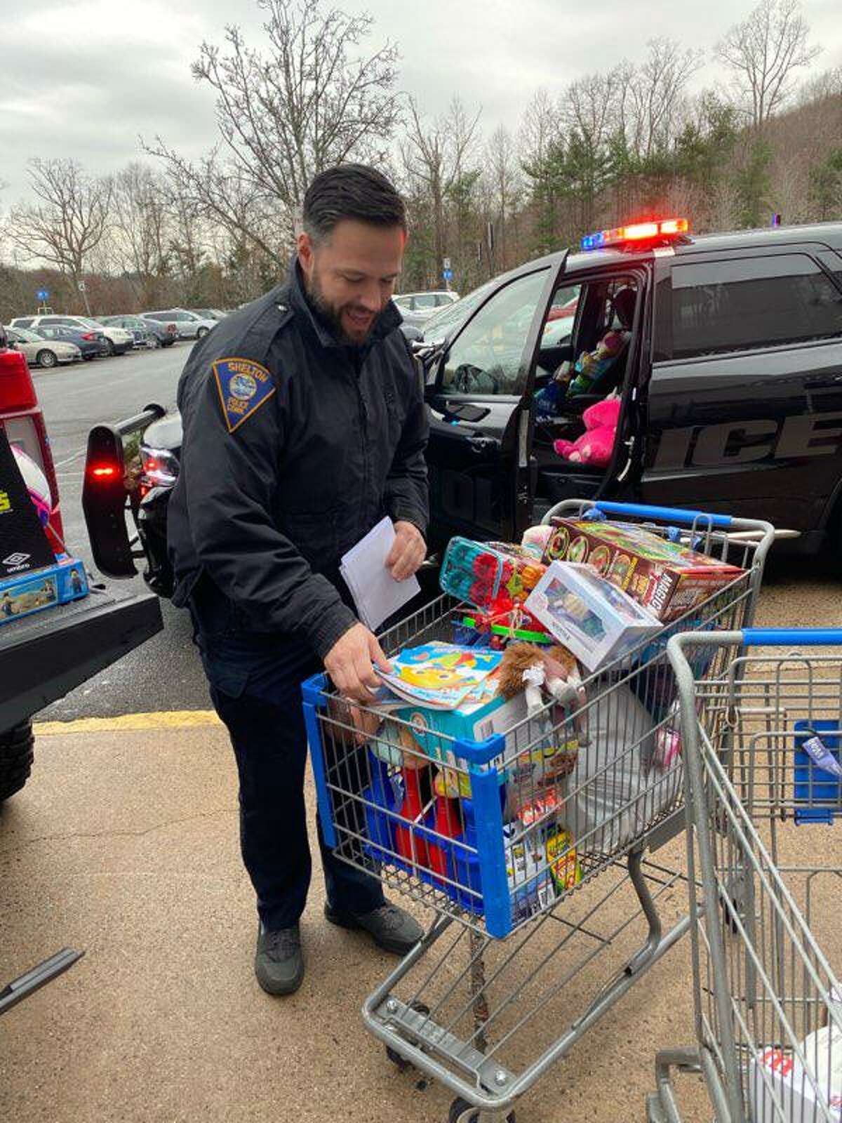 The Shelton Police Department held its first Stuff-a-Cruiser event Saturday, Dec. 18, 2021, at Walmart. People donated enough to more than fill the police cruiser with toys for families in need this holiday season.