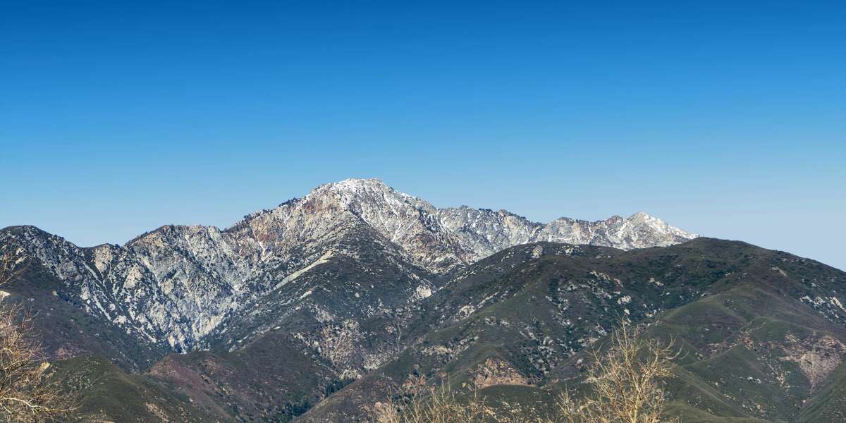 The San Gabriel Mountains with snow on Cucamonga Peak as seen from the Rancho Cucamonga area.