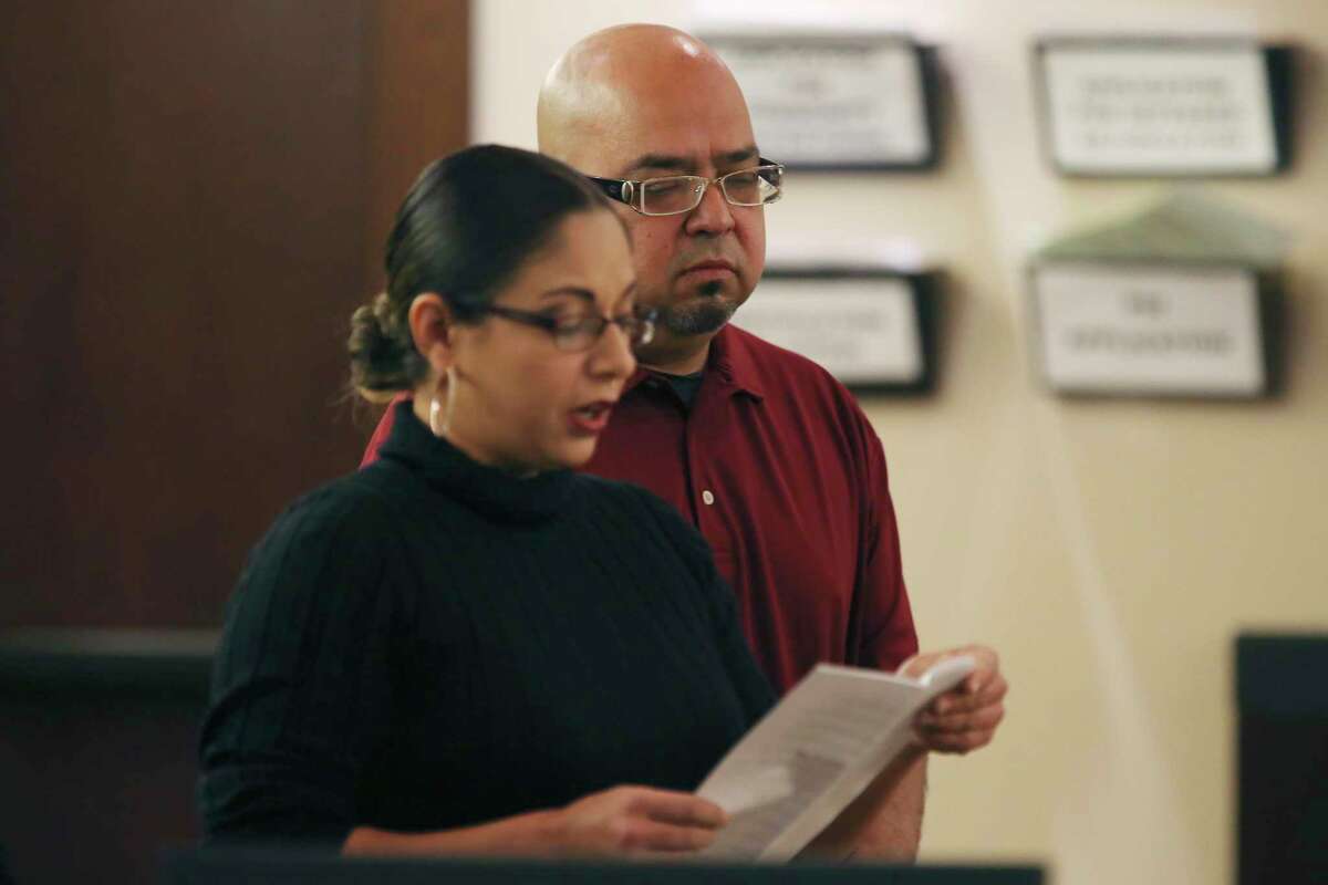 Martin Buenrostro listens as Bexar County District Attorney’s family advocate Alexis Smith reads an impact statement on behalf of his wife, Emelda, after the sentencing of Miguel Gutierrez to life in prison killing 11-month-old Xzavier Cortez. Buenrostro and his wife are the child’s grandparents.