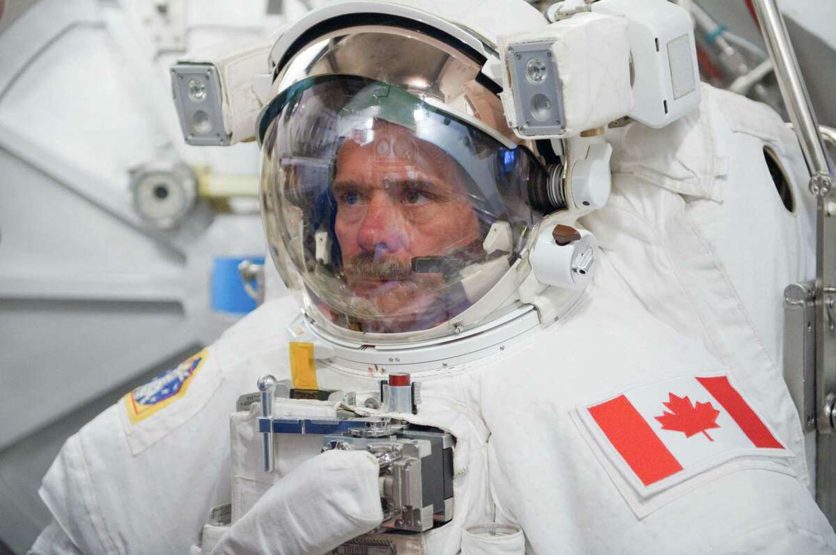 An undated photo provided by NASA of Canadian astronaut and crew member Chris Hadfield on July 31, 2012. Chris Hadfield went viral as an astronaut singing David Bowie in orbit.