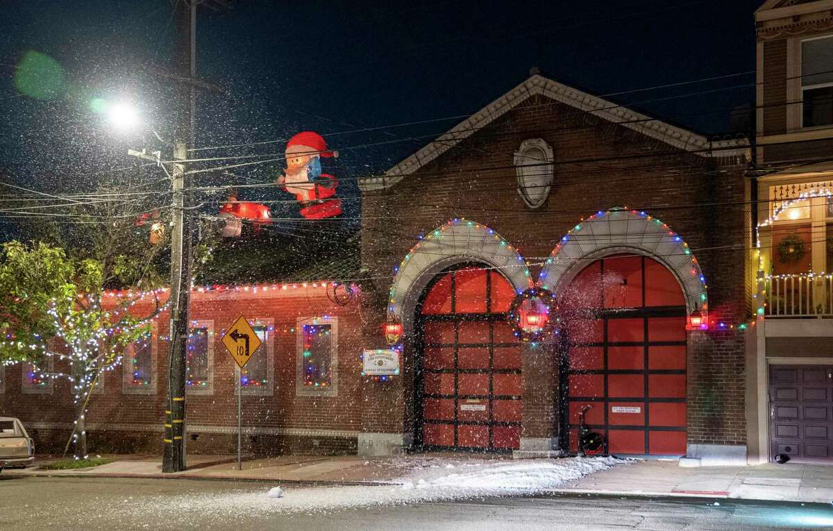 The San Francisco Fire Department Bureau of Equipment manufactured snow from foam for the 2021 holiday fire station decoration contest.