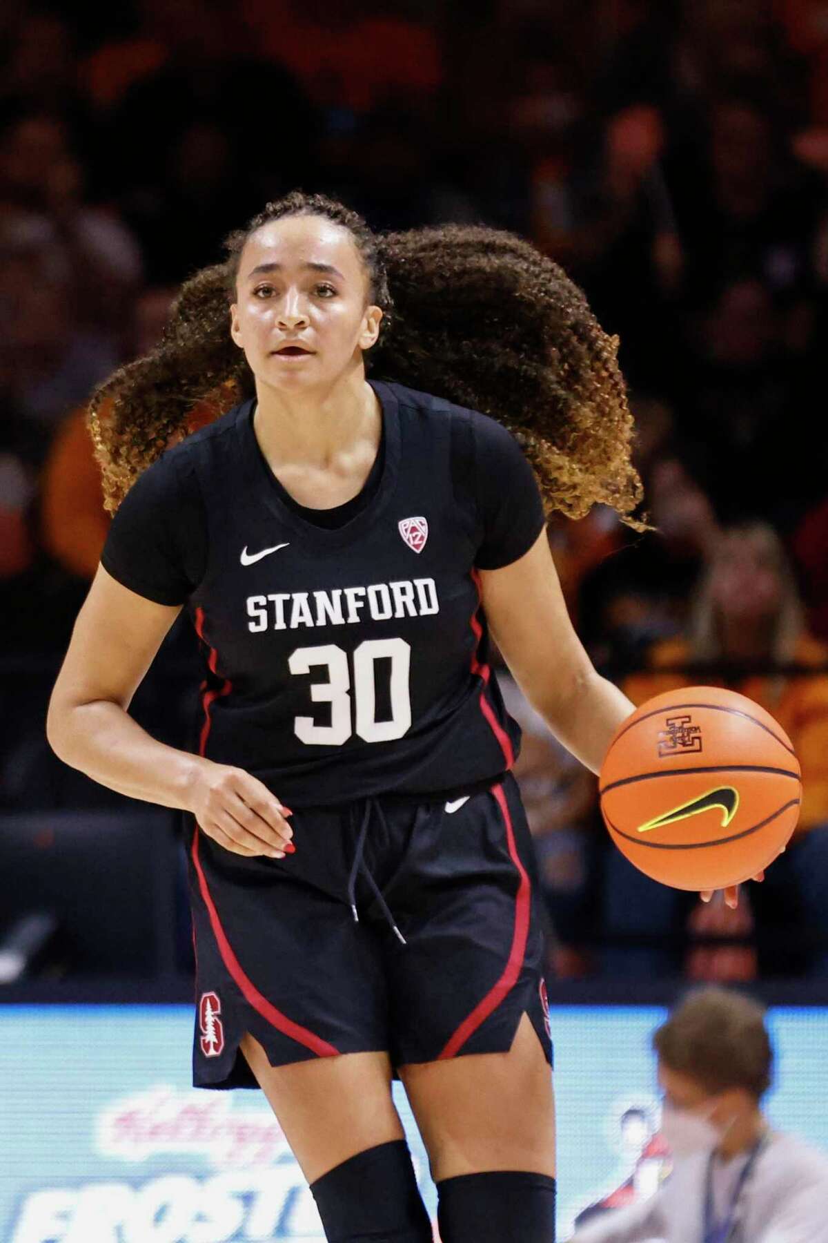Stanford guard Haley Jones (30) brings the ball up court during the first half of an NCAA college basketball game against Tennessee Saturday, Dec. 18, 2021, in Knoxville, TN. (AP Photo/Wade Payne)