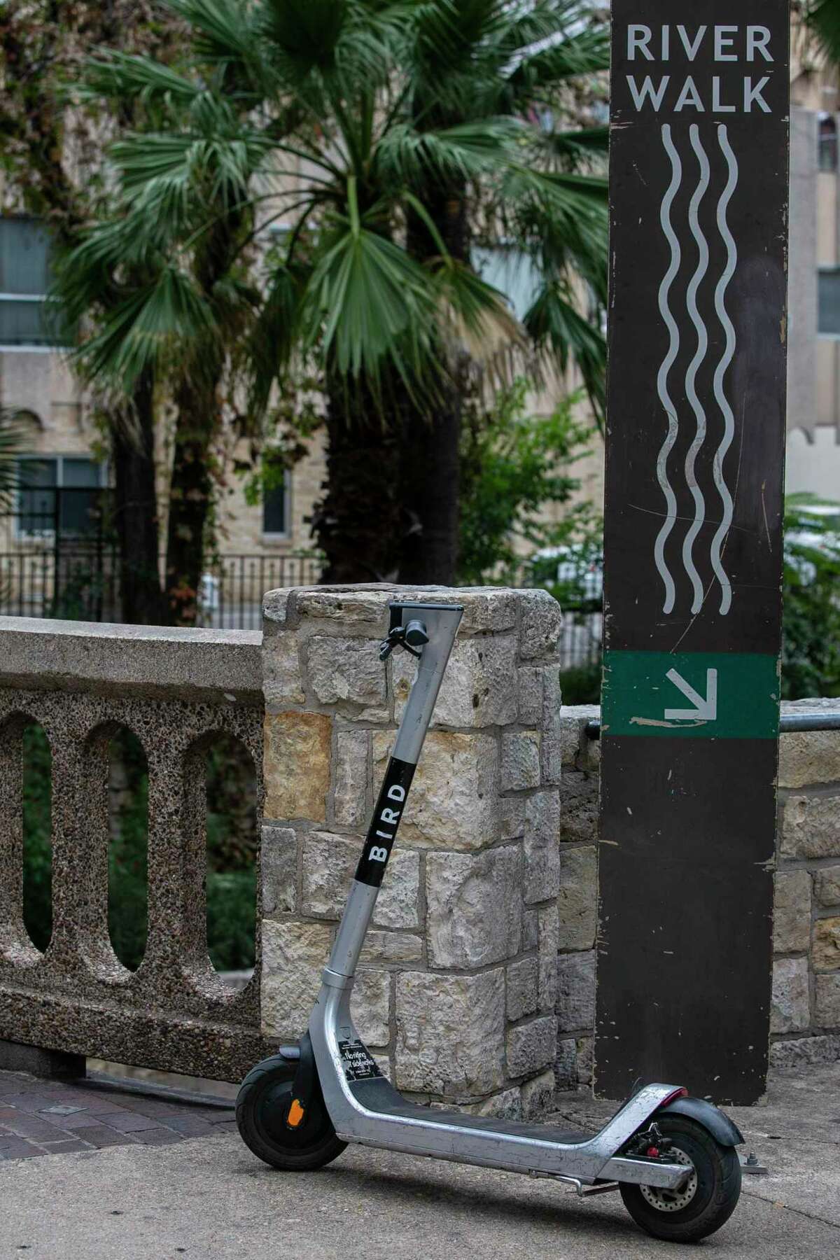 An electric Bird scooter is seen parked next to a South St. Mary’s Street in downtown San Antonio, Texas, on Nov. 24, 2021.