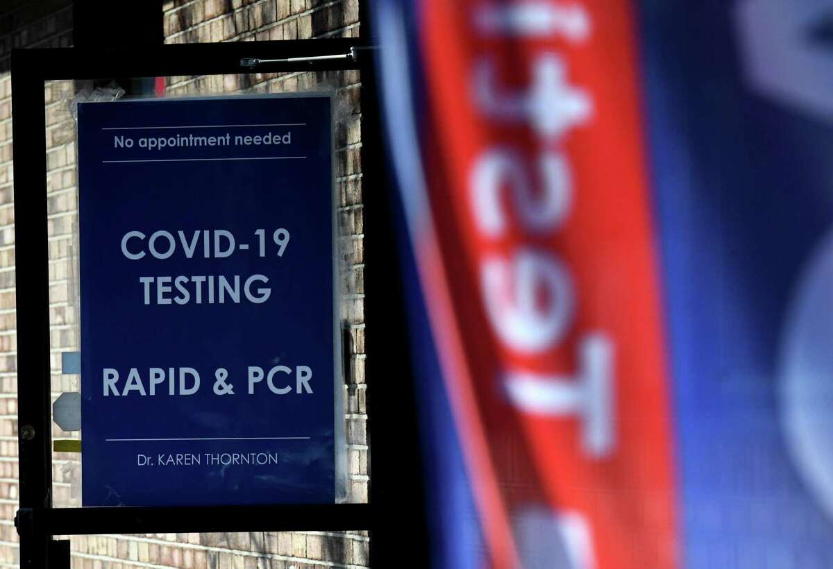 COVID-19 testing is advertised outside Dr. Karen Thornton's offices in the former First Care urgent care space on Monday, Dec. 21, 2021, on Delaware Avenue in Delmar, N.Y. Another pandemic wave shouldn't disrupt the hope of Christmas, says columnist Chris Churchill.