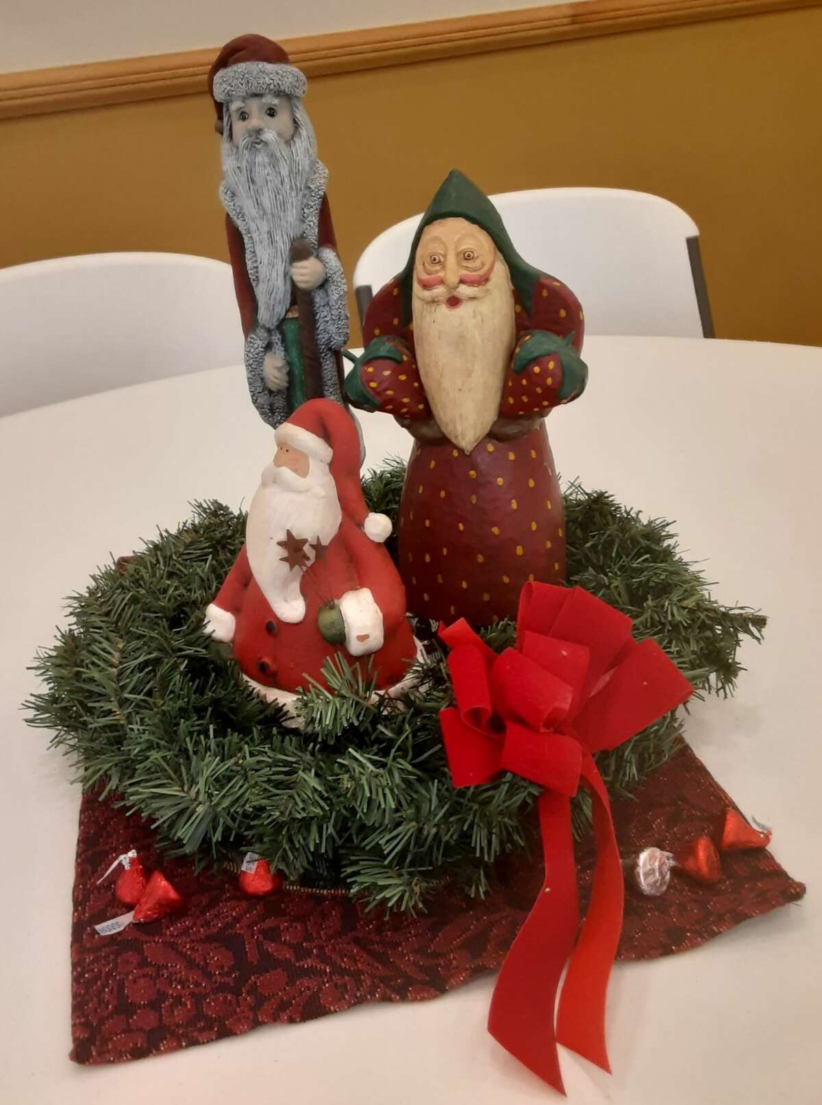 The Spirit of the Woods Garden Club, Inc. celebrated Christmas with a catered luncheon on Dec. 13. Tables were decorated with Santas from the collection of Dennis and Linda Otto. 