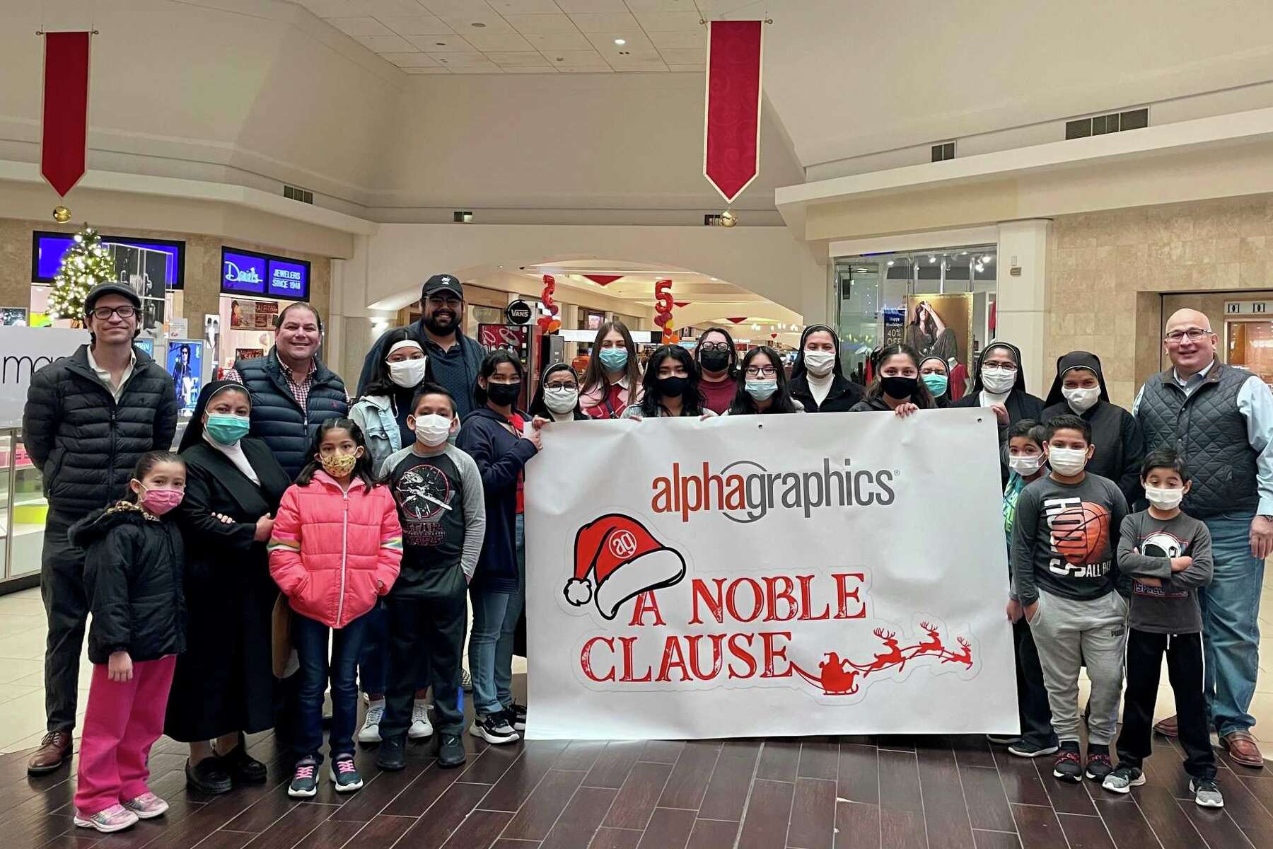 A Noble Clause' helps children have Christmas shopping spree