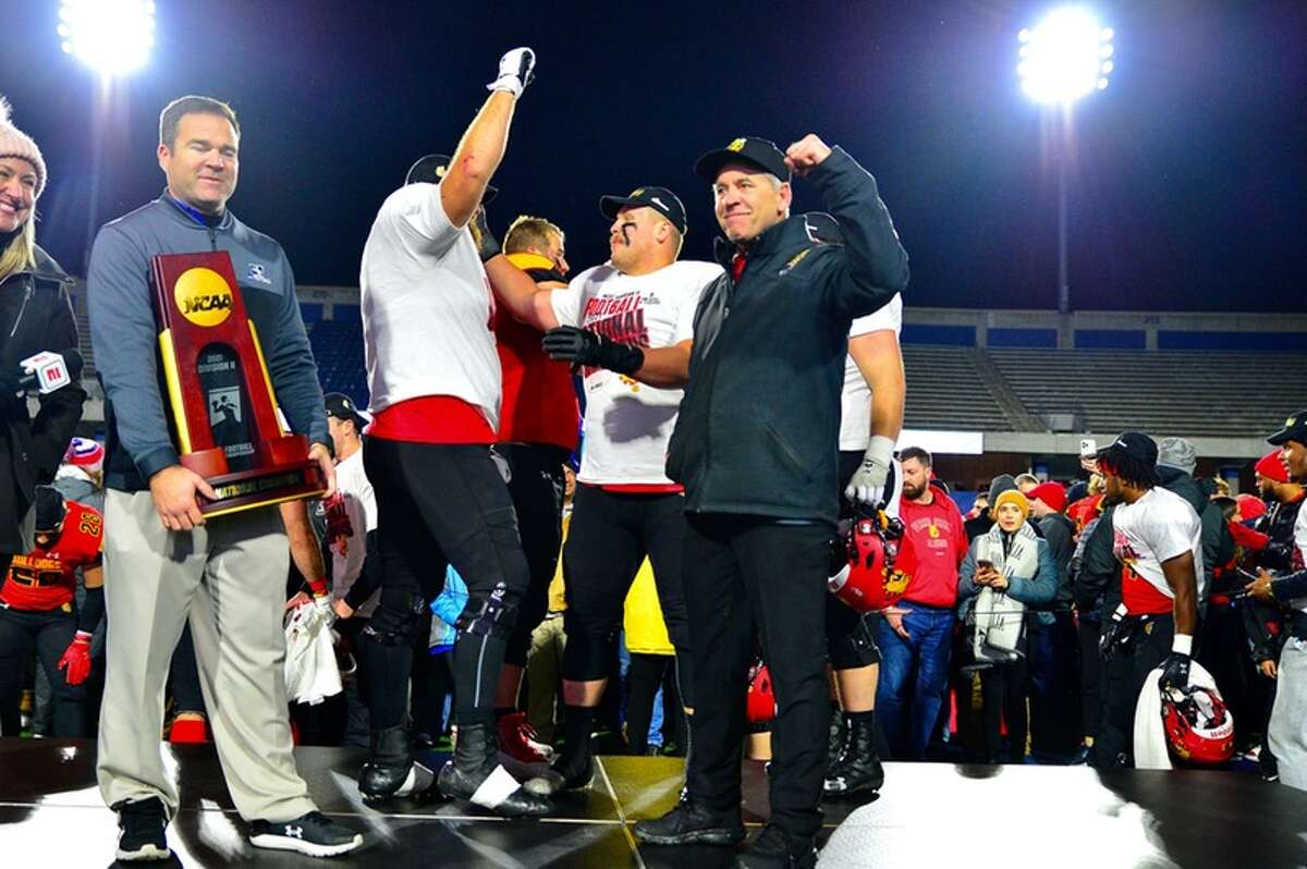 Tony Annese and his football players accept the national championship trophy on Saturday.