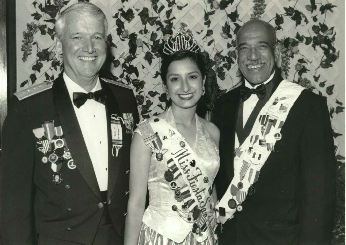 Gen. Billy Boles, commander of the Air Education and Training Command, Miss Fiesta Monique Madero, and Don Moye, president of the Fiesta Commission, at the Randolph AFB Officers Club in 1996.