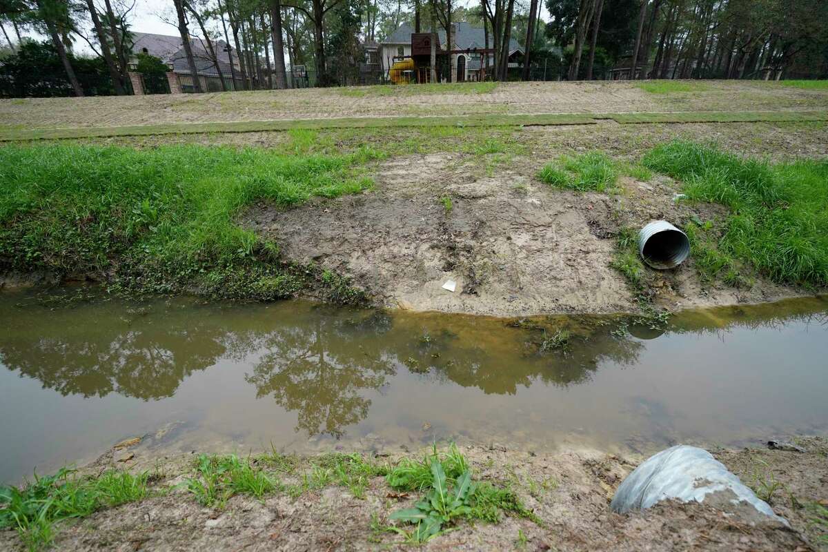 New drainage pipes along a tributary that flows into Cypress Creek is shown at Raveneaux County Club Friday, Jan. 17, 2020, in Spring. As the Harris County Flood Control District looks for more sites to store storm water in flood events, it is increasingly turning to golf courses.