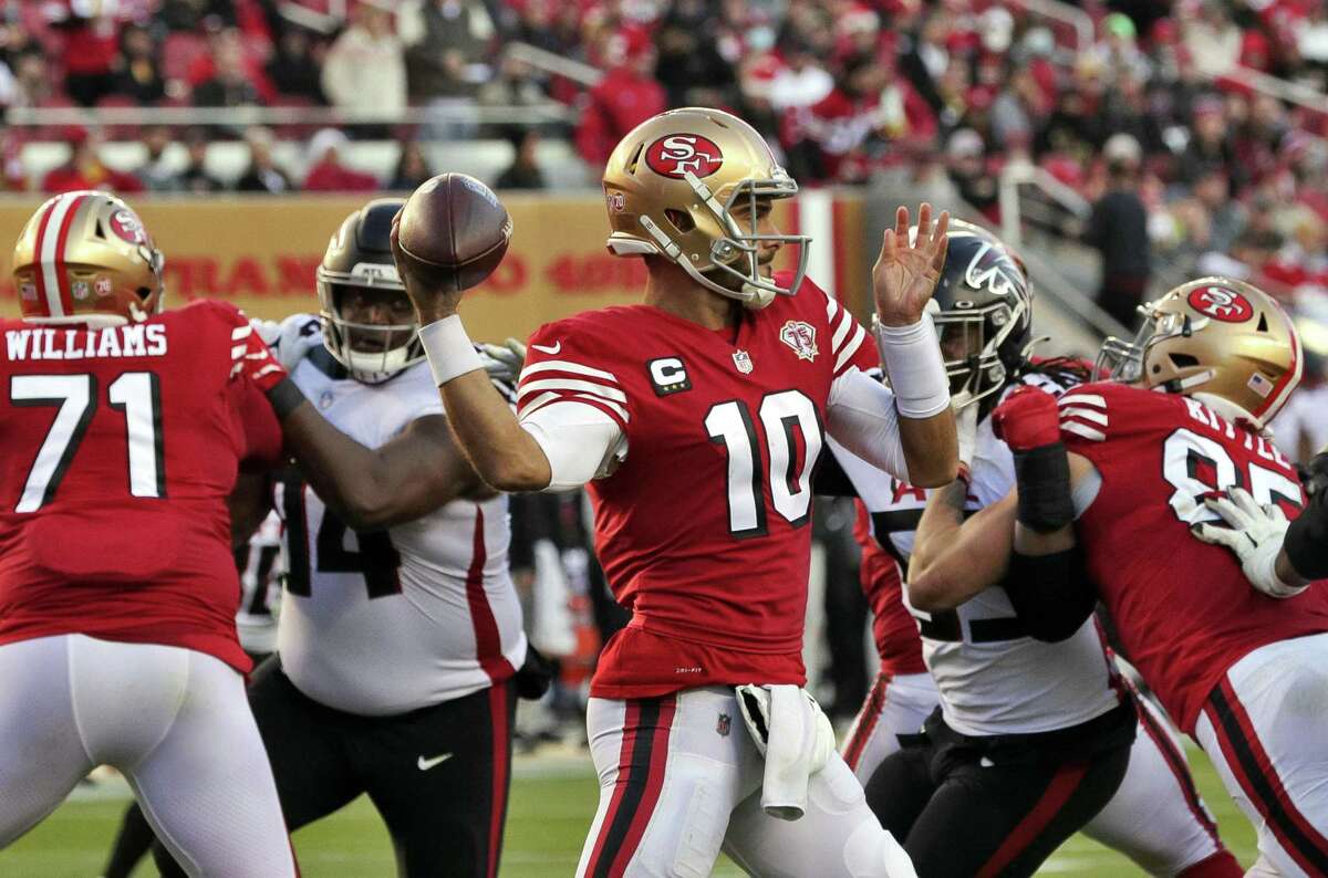 San Francisco 49ers quarterback Jimmy Garoppolo throws downfield against Atlanta on Dec. 19, 2021. A Falcons employee sued the 49ers in federal court Friday, in the wake of a data breach incident.