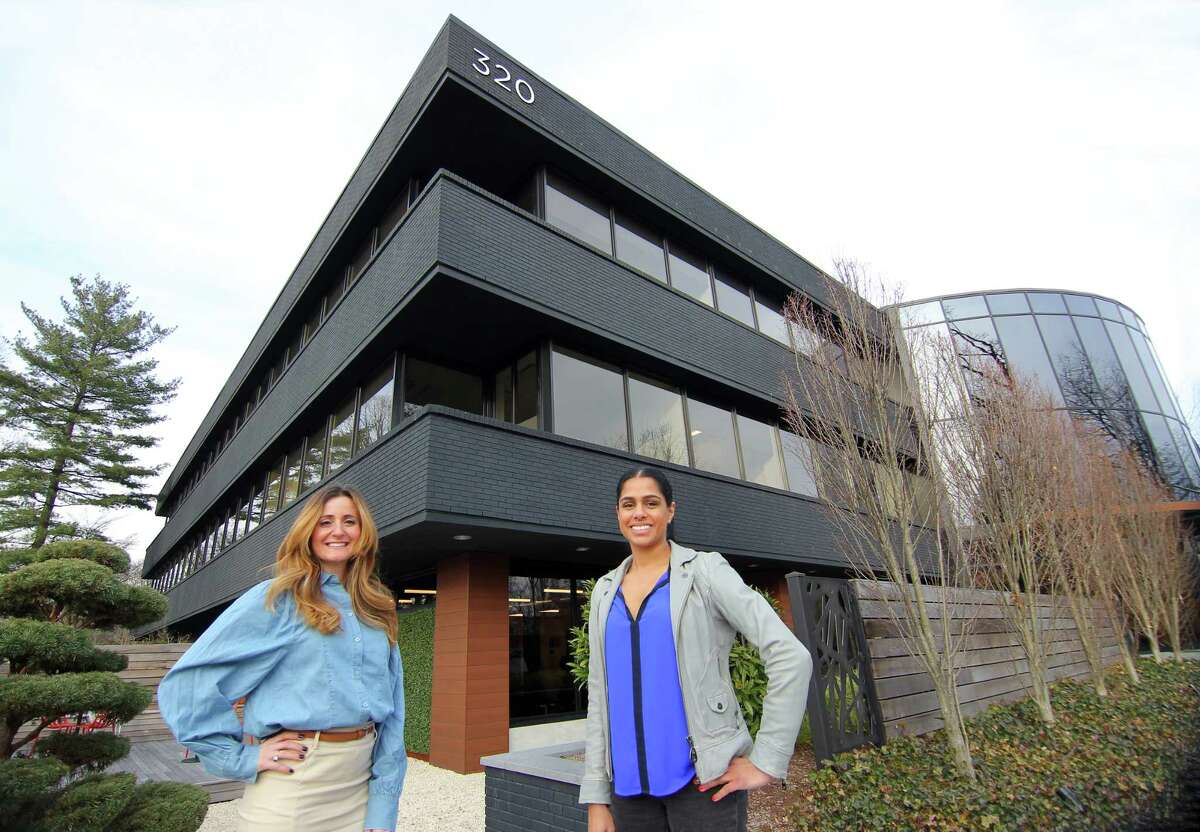 Connectalent founders Jasmine Silver and Runa Knapp, right, pose together at their headquarters in Darien, Conn., on Tuesday December 21, 2021. Connectalent is a full service talent recruitment firm specializing in helping female executives return to work.