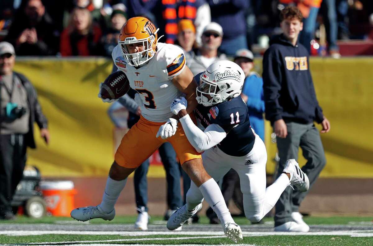 UTEP wide receiver Reynaldo Flores (3) is sacked by Fresno State defensive back Cale Sanders Jr. (11) during the first half of the New Mexico Bowl NCAA college football game Saturday, Dec. 18, 2021, in Albuquerque, N.M. (AP Photo/Andres Leighton)