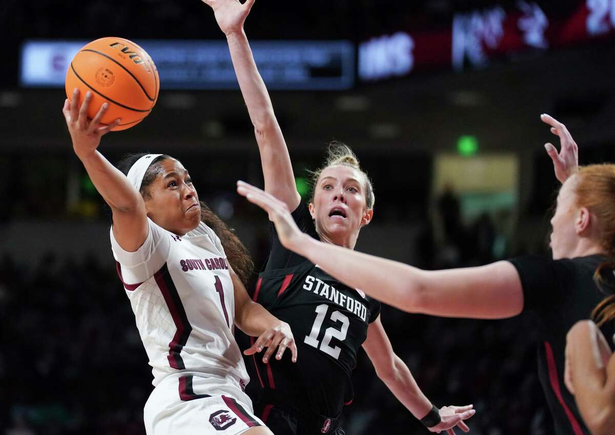 South Carolina guard Zia Cooke shoots while defended by Stanford guard Lexie Hull (12) during the first half in Columbia, S.C.