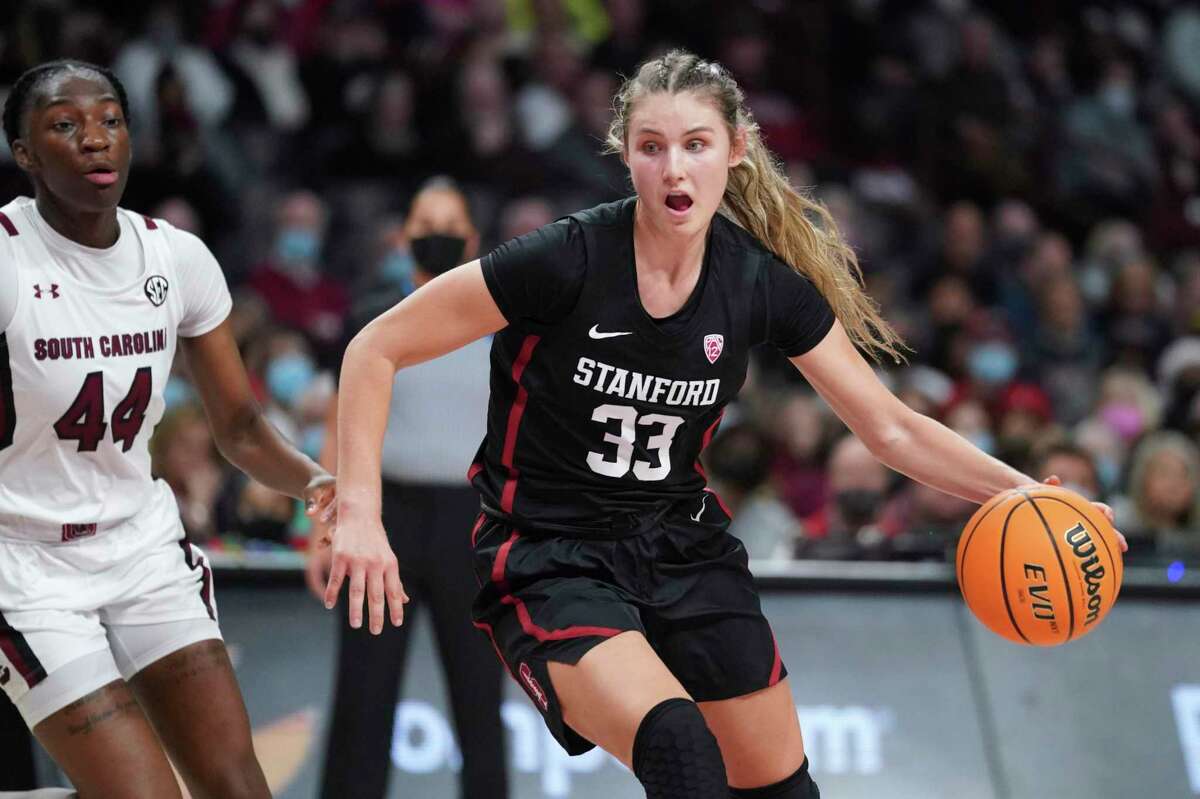 Stanford guard Hannah Jump (33) is defended by South Carolina guard Saniya Rivers (44) during the first half of an NCAA college basketball game Tuesday, Dec. 21, 2021, in Columbia, S.C. (AP Photo/Sean Rayford)