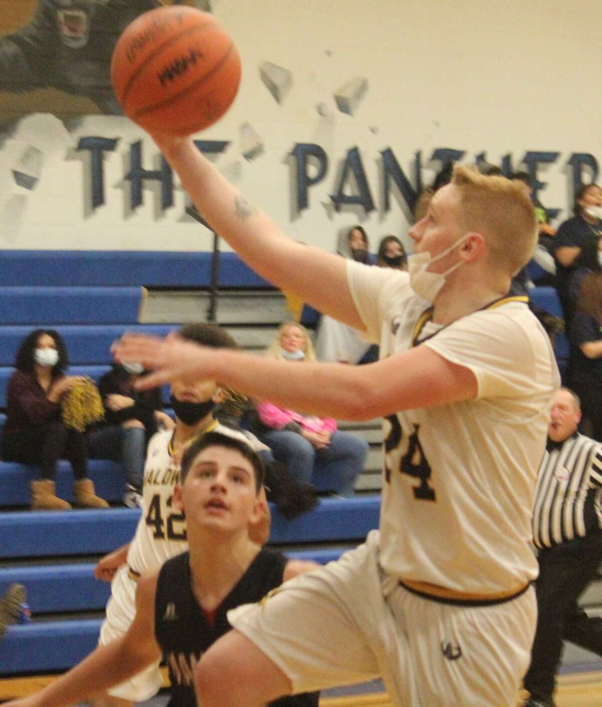 Baldwin Jessie Pancio flies to the basket on Thursday against Manistee Catholic Central.