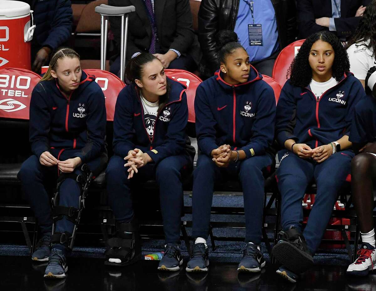 From the left, UConn’s Paige Bueckers, Nika Muhl, Aubrey Griffin, and Azzi Fudd in the second half during a game on Sunday.