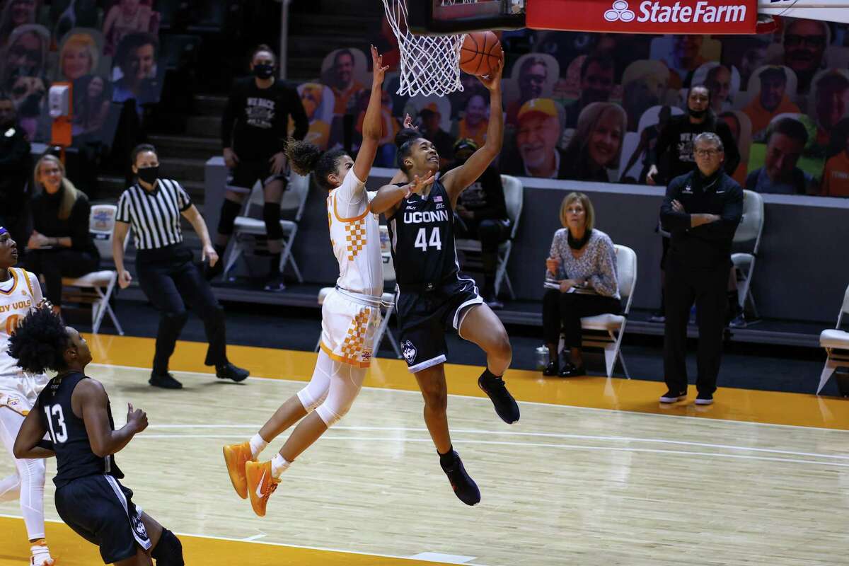 UConn’s Aubrey Griffin (44) goes to the basket against Tennessee guard Rae Burrell (12) during the second half.