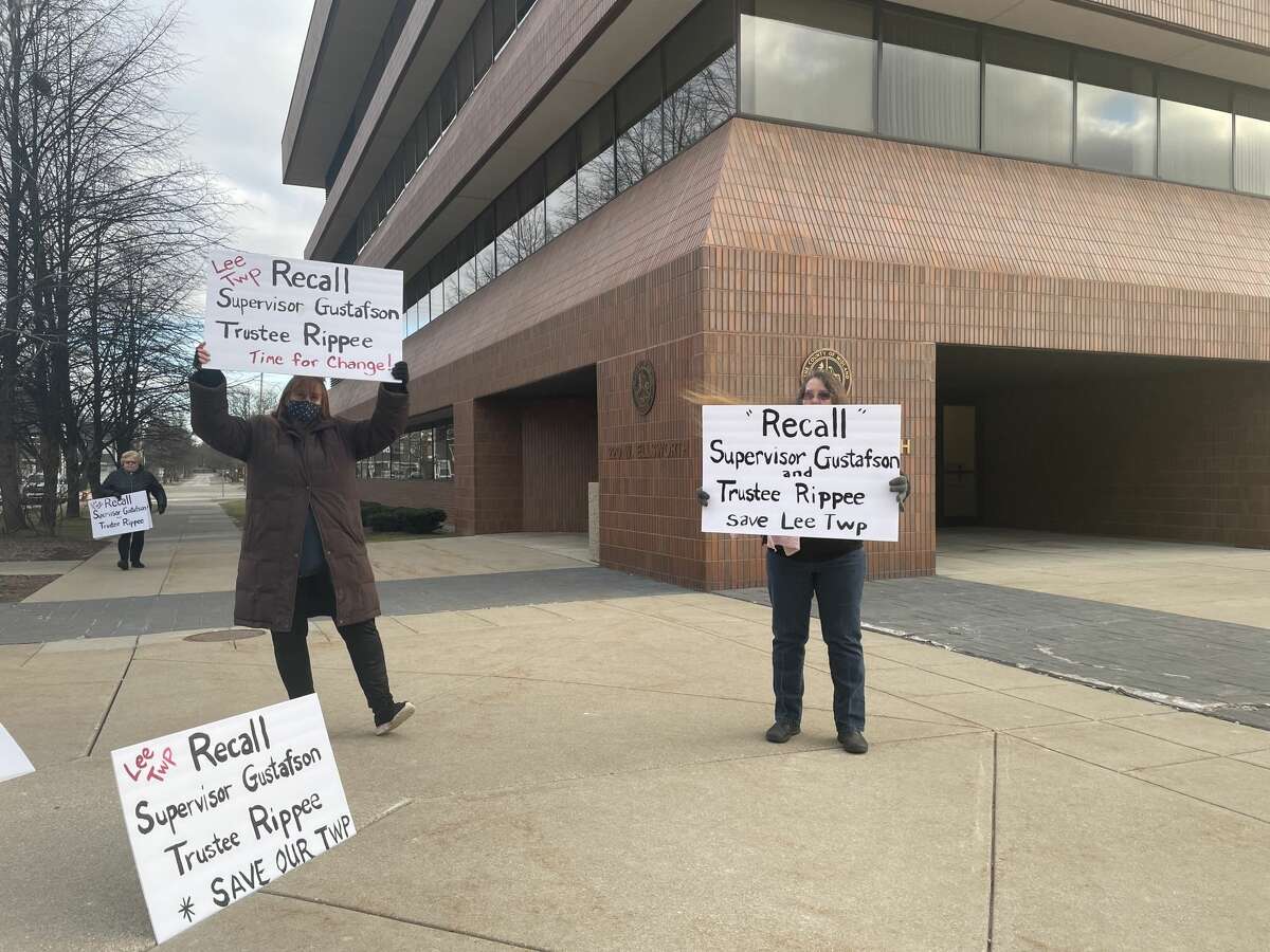Lee Township residents protest outside of the County Services Building for a recall hearing that was adjourned due to a potential COVID-19 exposure