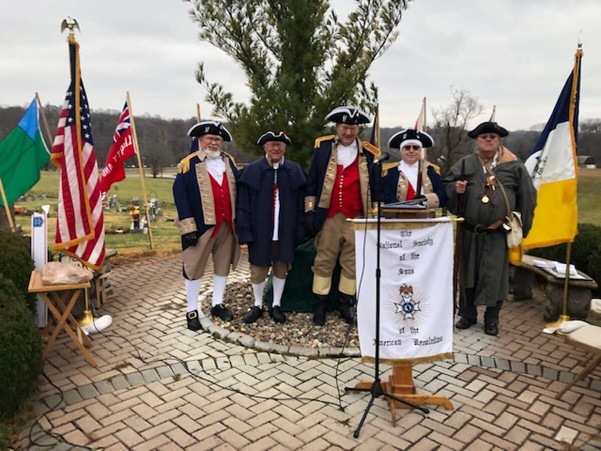 The Genl. George Rogers Clark Sons of the American Revolution chapter marked its Wreath Across America event on Dec. 11. Pictured from left are Robert Ridenour, Chapter Treasurer; Eric Reelitz, Chapter Chaplin; Phil Bailey, Wreaths Chairman; Richard Ruedin, Chapter President; and Dennis Lybarger, Chapter Musket Specialist.