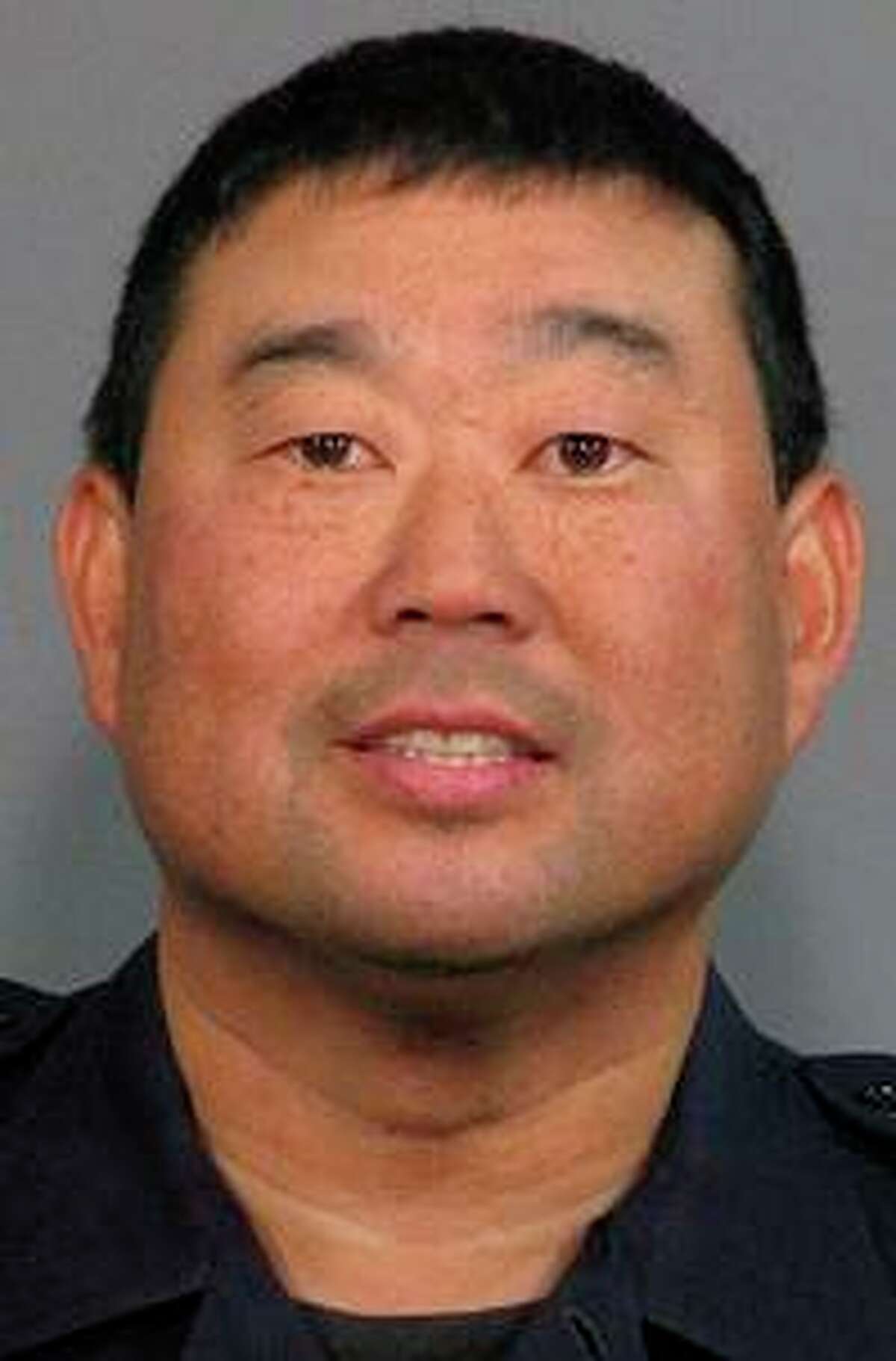 This 2011 photo provided by the San Jose Police Department shows former San Jose Officer Kevin Nishita. Nishita, a retired officer and armed guard who provided security for many reporters in the region, was fatally shot in the abdomen during an attempted robbery of KRON-TV camera equipment in Oakland on Nov. 24.