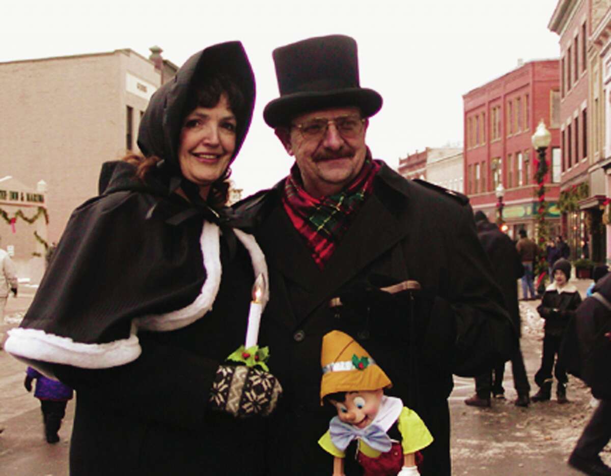 David and Jeanne Barber enjoy their favorite parade of the year, the Victorian Sleighbell Parade and Old Christmas Weekend.