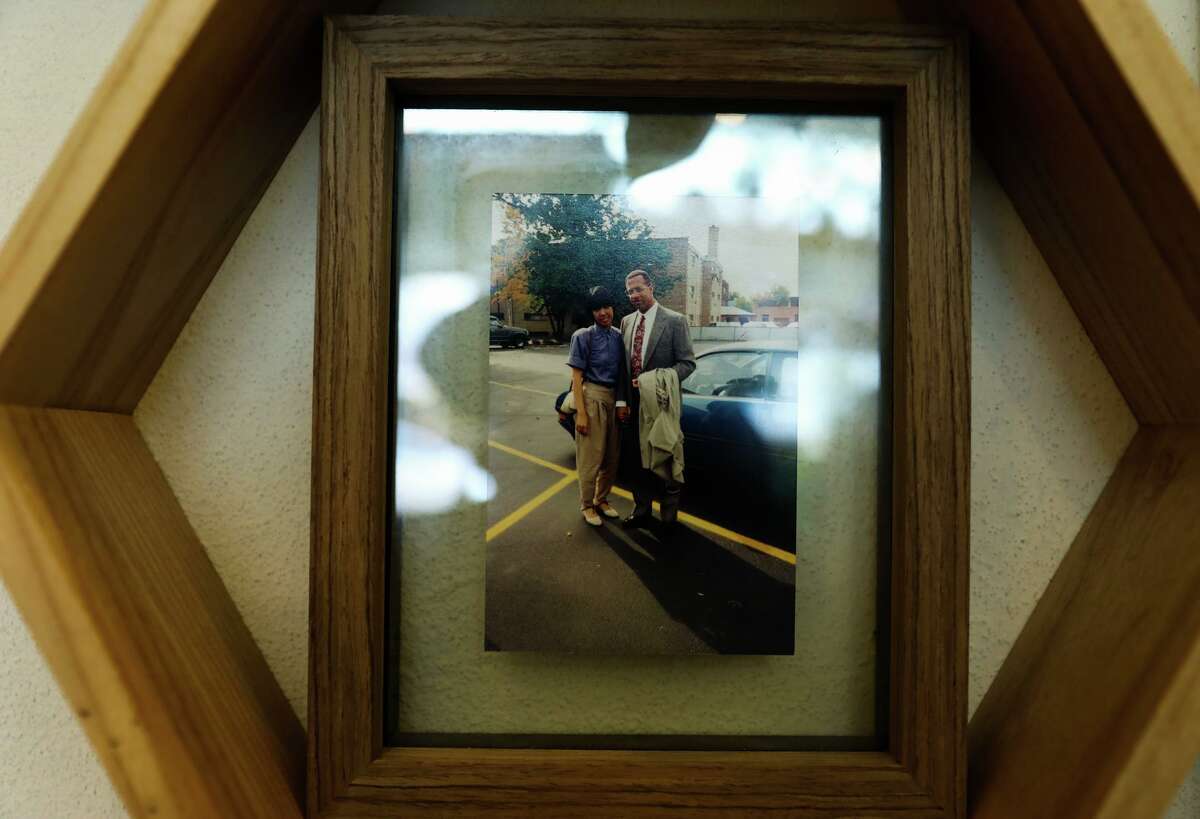 A photo hangs inside Oakland plant shop Planterday of Matt Day’s late parents, Lisa and Frank Day.
