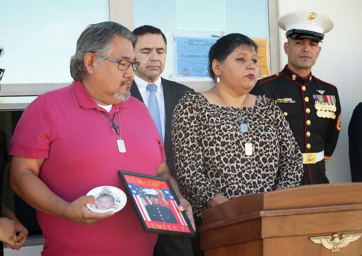 The Parents of Lance Cpl. David Lee Espinoza — Victor Manuel Dominguez and Elizabeth Holguin — show gratitude and sorrow as they remember their son and are presented with a new home on Wednesday, Dec. 22, 2021.