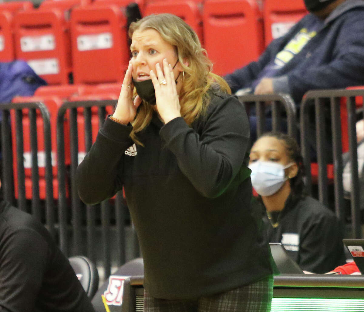 SIUE coach Samantha Quigley Smith tries to make sense of an official's call during a game against Arkansas State on Wednesday night at First Community Arena in Edwardsville.