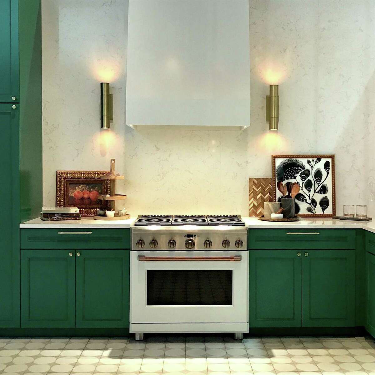 GE was a little ahead of its time for its 2019 Kitchen and Bath trade show in Las Vegas, creating emerald green cabinets for a vignette featuring its higher-end GE Cafe line of ranges and range hoods. More colorful rooms --- especially in green -- will be a big trend for 2022.