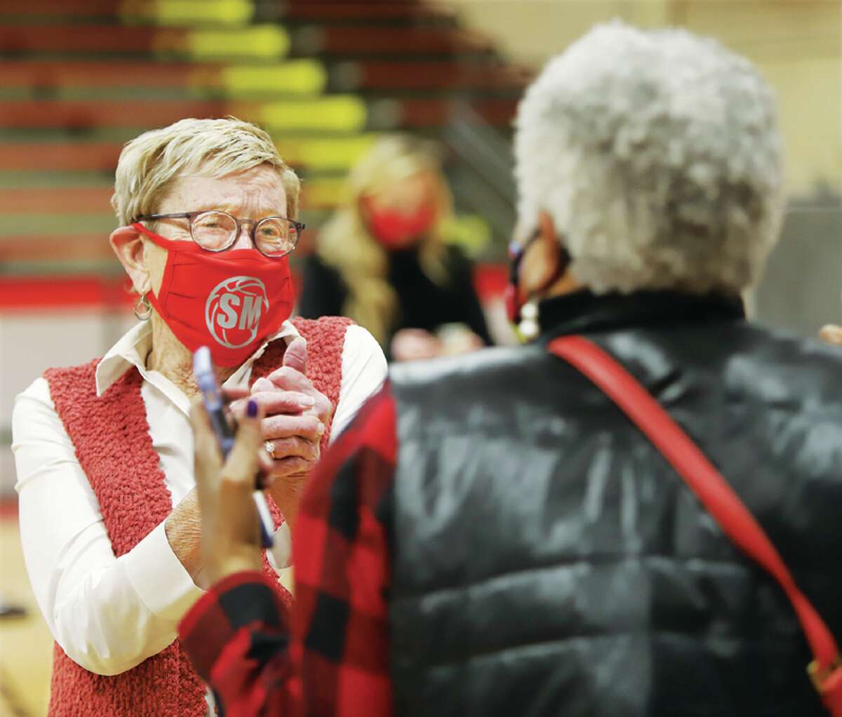 Millicent McAfoos, widow of the late Stan McAfoos, was emotional on Jan. 21 as she greeted old friends at the dedication ceremony to re-name the gym at West Elementary in honor of the legendary basketball coach.