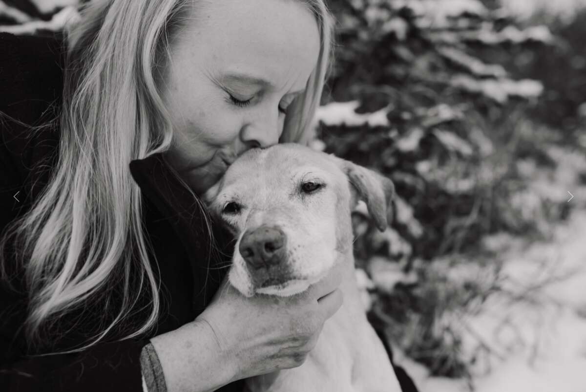 Earhart captures dog owners and their pets as they enjoy their favorite activities together and snuggle up in meaningful spaces.