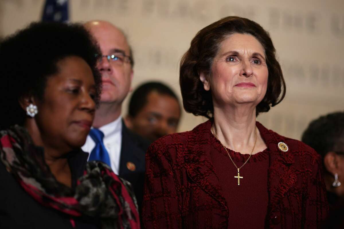 WASHINGTON, DC - JANUARY 08: Lynda Johnson Robb, daughter of President Lyndon Johnson and wife of former Sen. Chuck Robb (D-Va.), joins Democratic members of the House of Representatives during an event marking the 50th anniversary of the start of the War on Poverty at the U.S. Capitol Visitors Center January 8, 2014 in Washington, DC. The War on Poverty is the unofficial name for legislation first introduced by President Johnson during his State of the Union address on January 8, 1964, which led the United States Congress to pass the Economic Opportunity Act, which established the Office of Economic Opportunity (OEO) to administer the local application of federal funds targeted against poverty. (Photo by Chip Somodevilla/Getty Images)