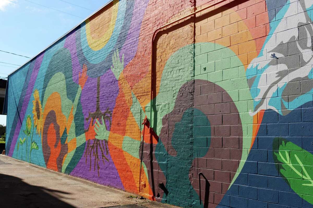 Artist Suzy Gonzalez's mural "La Gran Dualidad" adorns one side of Pasadena Sporting Goods, 115 E. Pasadena Freeway.